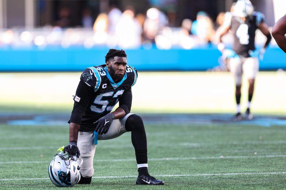 Panthers defensive end Brian Burns kneels solemnly while awaiting the referees verdict on whether the Vikings final drive was deemed a touchdown during the game at Bank of America Stadium on Sunday, October 17, 2021 in Charlotte, NC. The touchdown was confirmed and gave the Vikings the win against the Panthers in overtime with a final score of 34-28.