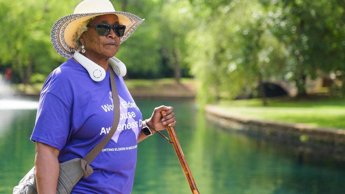 Shirley Beckwith, a volunteer with the AARP, participates in an elder abuse awareness walk at Freedom Park on Tuesday, June 4, 2024, in Charlotte. The walk was intended to raise awareness about elder abuse, neglect, and exploitation, as well as educate older adults, friends, families and caregivers.