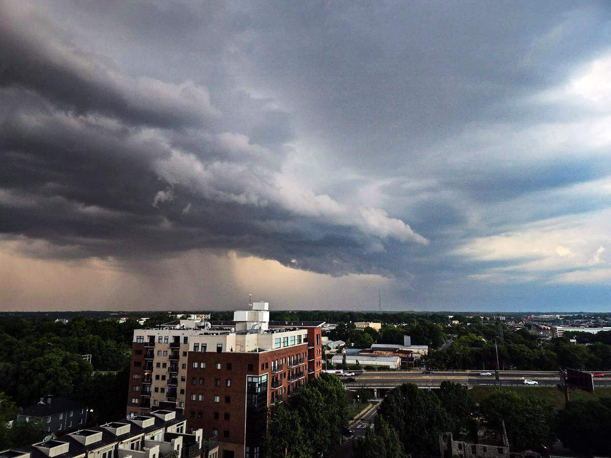 Dark clouds cover uptown Charlotte as rain starts on Thursday, May 8, 2025. Expect inches of rain in the Charlotte region for the coming week, NC forecaster says