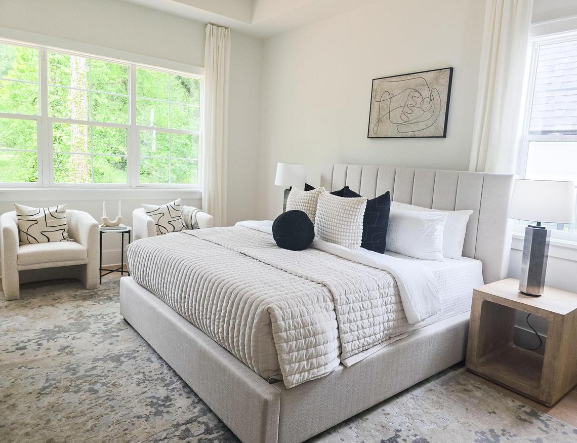 A bedroom is displayed in a new home at The Enclave at Enderly Park. Developer James Scruggs said the subdivision is an ode to the neighborhoods history and a benefit to its future.