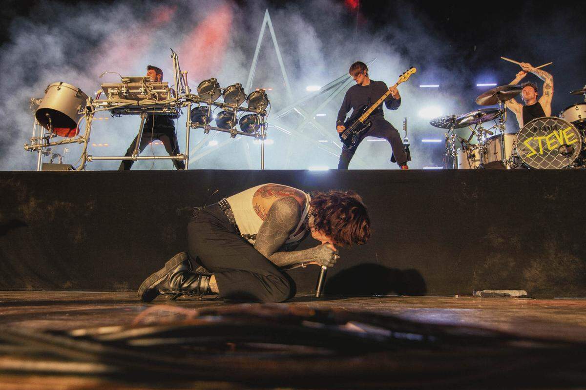 Oliver Sykes of Bring Me the Horizon performs at PNC Music Pavilion on Friday night.