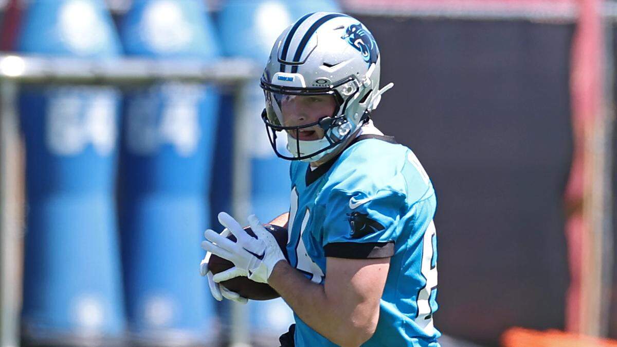 Carolina Panthers tight end Mitchell Evans runs downfield after catching a pass during the team’s rookie minicamp practice on Friday, May 9, 2025.