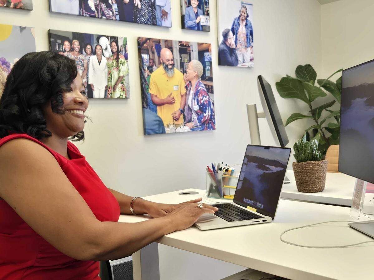 Nikita Allen works inside her office for Growmetix off Carmel Commons Boulevard in south Charlotte.