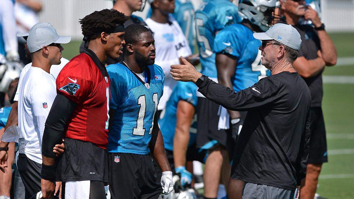 Carolina Panthers quarterback Cam Newton, left and wide receiver Torrey Smith, center, listen to offensive coordinator Norv Turner, right, during a break in practice on Friday, July 27, 2018 at Wofford College in Spartanburg, SC. The Panthers are holding training camp at Wofford College.