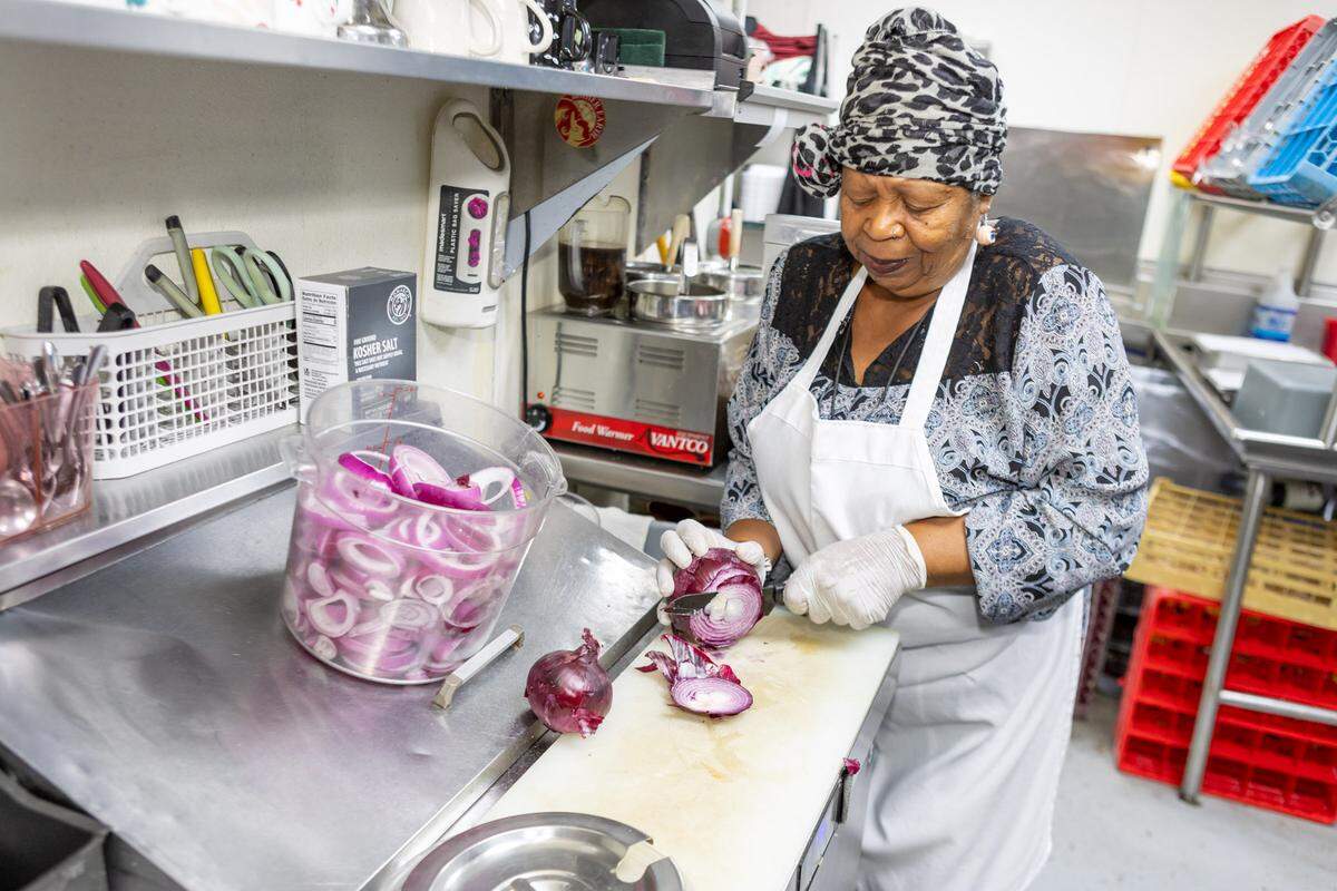 Bernice Barrett has been holding down the kitchen at Beef ‘N Bottle for 52 years, dancing while she works.