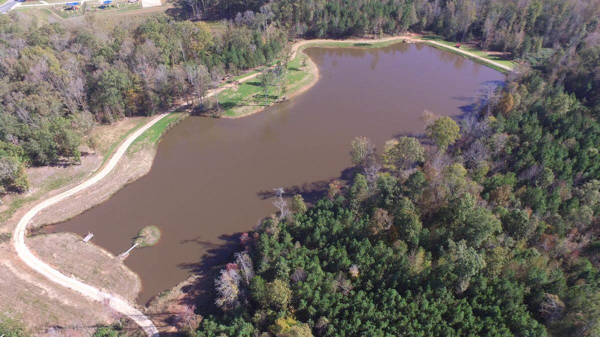 The new Hall Family Farm includes a 6-acre pond built to supply irrigation water.
