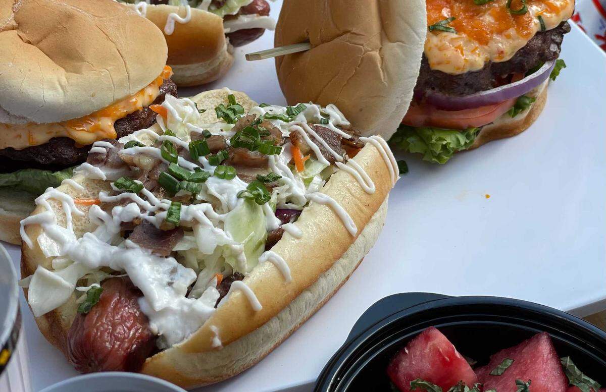 This isn’t your average hot dog. This jumbo version is topped with orange soda cole slaw, horseradish cream and green onions.