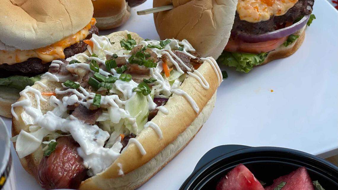 At a Knights Baseball game, order a jumbo hot dog topped with orange soda cole slaw, horseradish cream and green onions.