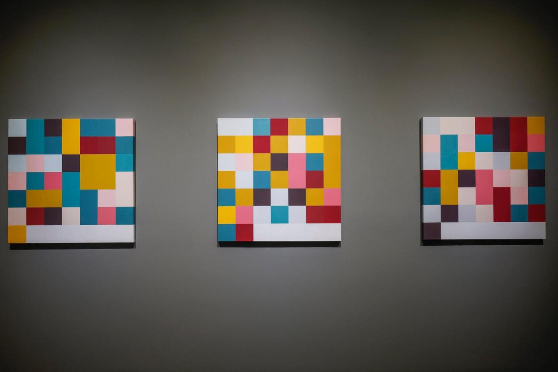 Kristin McIver’s Data Portraits on display at the Bechtler Museum portrays faces in blocks of color, drawn from data interpretations of several Warhol portraits.