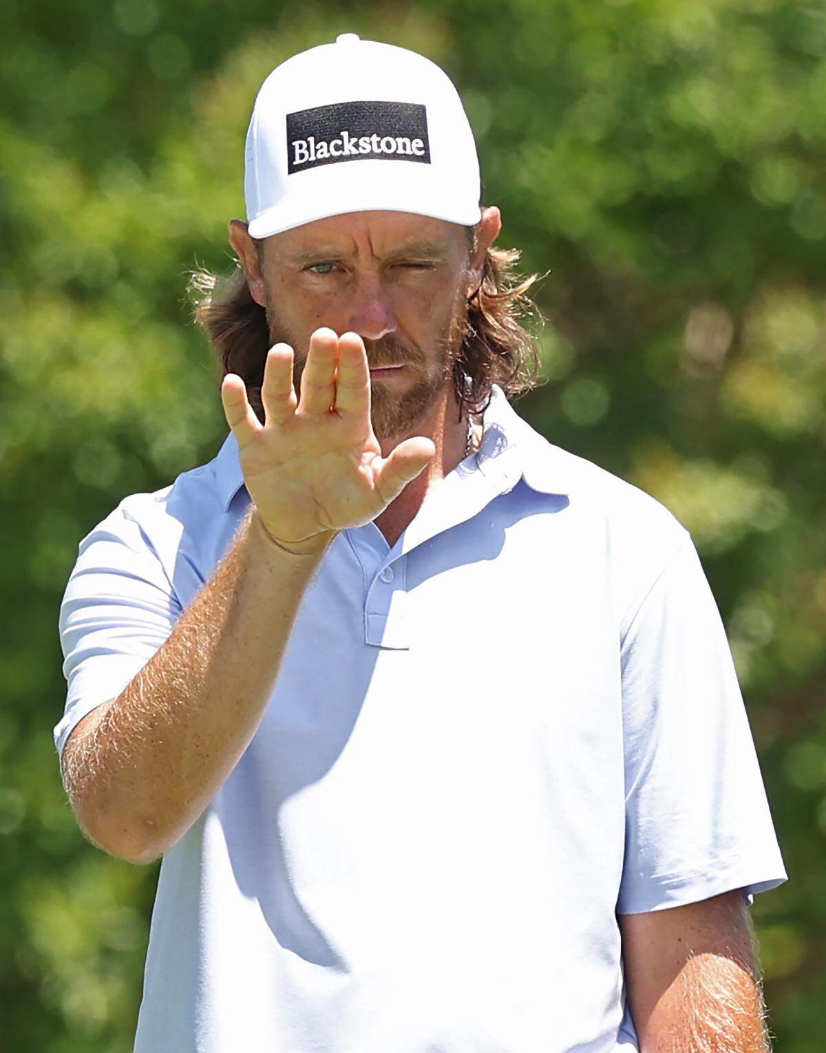 Tommy Fleetwood lines up his putt on the fifth green during Round 2 of the Truist Championship at Quail Hollow Club on Friday, May 8, 2026.