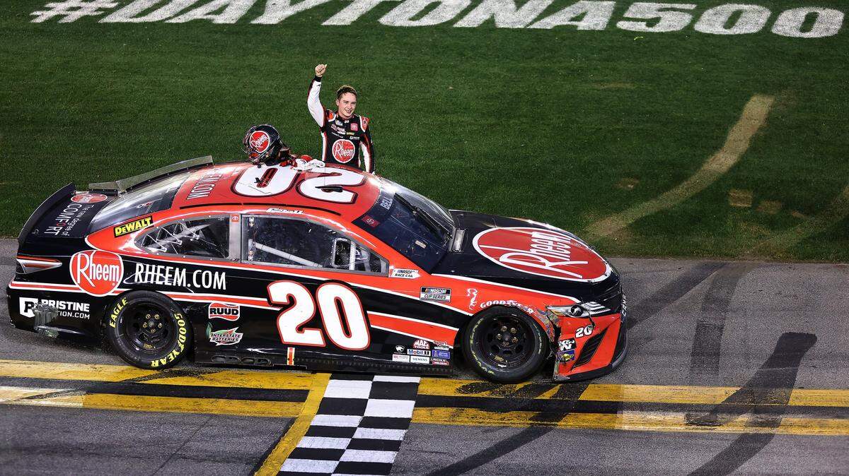 DAYTONA BEACH, FLORIDA - FEBRUARY 21: Christopher Bell, driver of the #20 Rheem Toyota, celebrates after winning the NASCAR Cup Series O’Reilly Auto Parts 253 at Daytona International Speedway on February 21, 2021 in Daytona Beach, Florida. (Photo by James Gilbert/Getty Images)