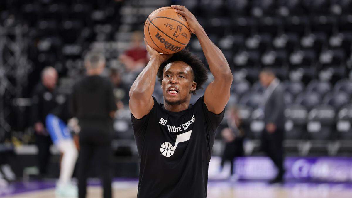 Collin Sexton (2) warms up before the game against the Oklahoma City Thunder] at Delta Center.