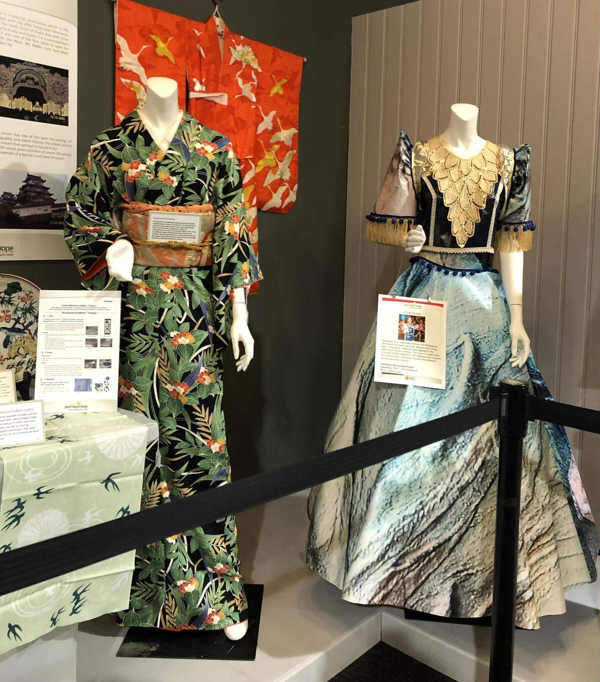 A dress designed by Edelweiss Vogel out of upcycled billboard was on display from May to July at the Charlotte Museum of History for the AAPI Exhibit “The Journey of Hope.”