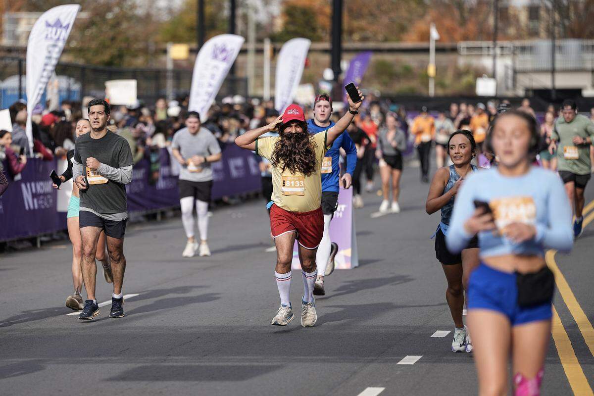 Participants compete in the Novant Health Charlotte Marathon Saturday, Nov. 15, 2025, in Charlotte, N.C.