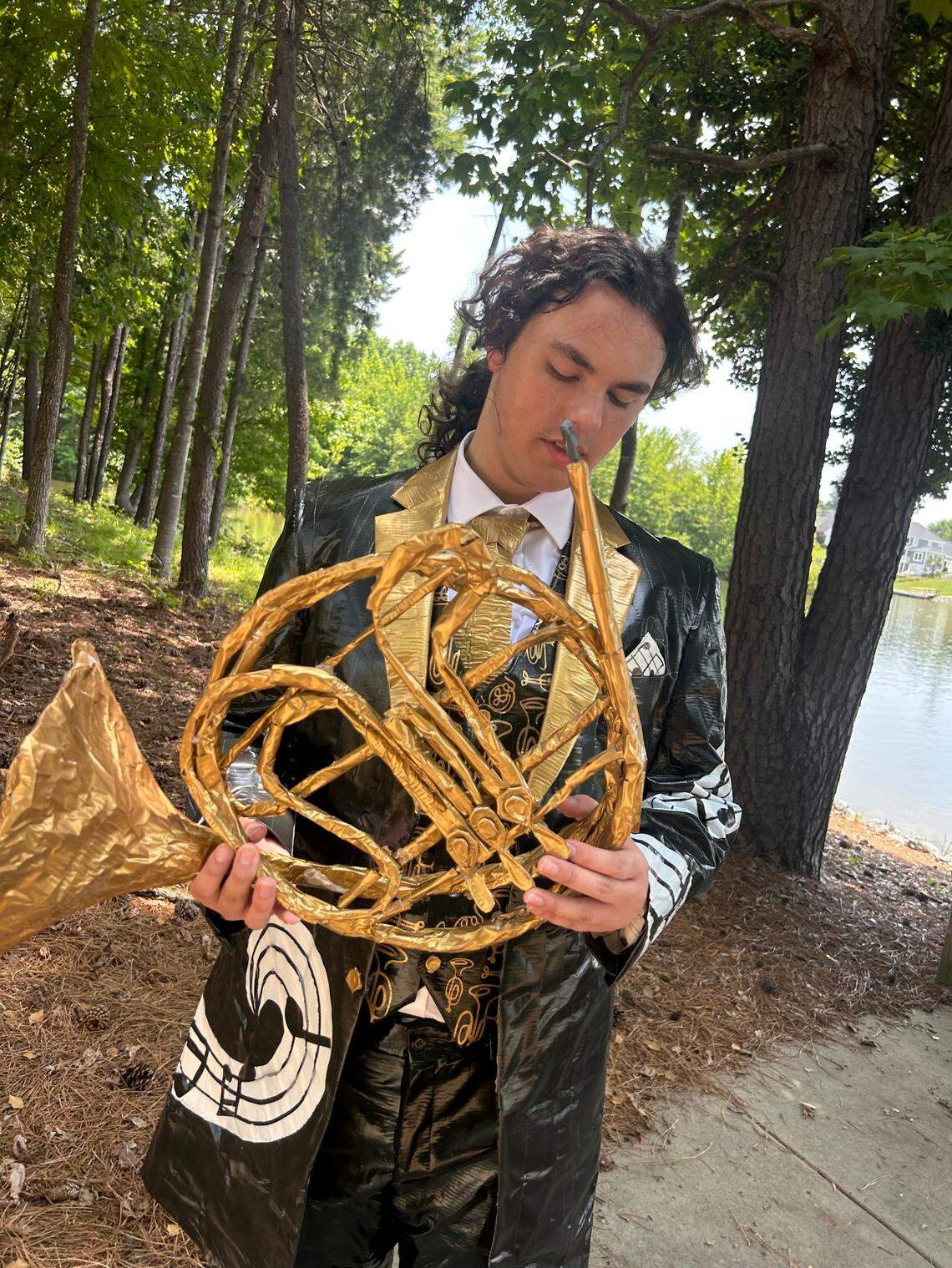 Nicholas Moore, a rising senior at South Iredell High School in Troutman NC, is a finalist in a national competition for his marching band-inspired prom tuxedo made of Duck Brand duct tape.