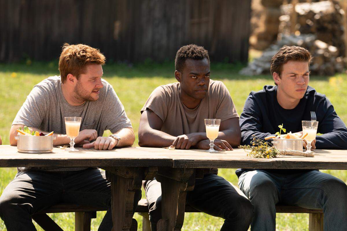 Jack Reynor, William Jackson Harper and Will Poulter star in “Midsommar.”