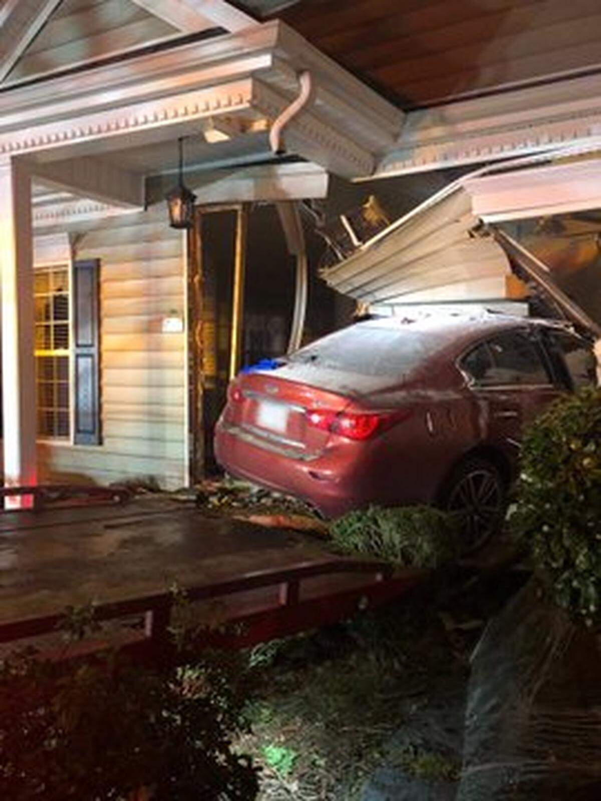 Firefighters extracted a driver from this car that smashed into a home in Huntersville on Friday, Jan. 29, 2021.