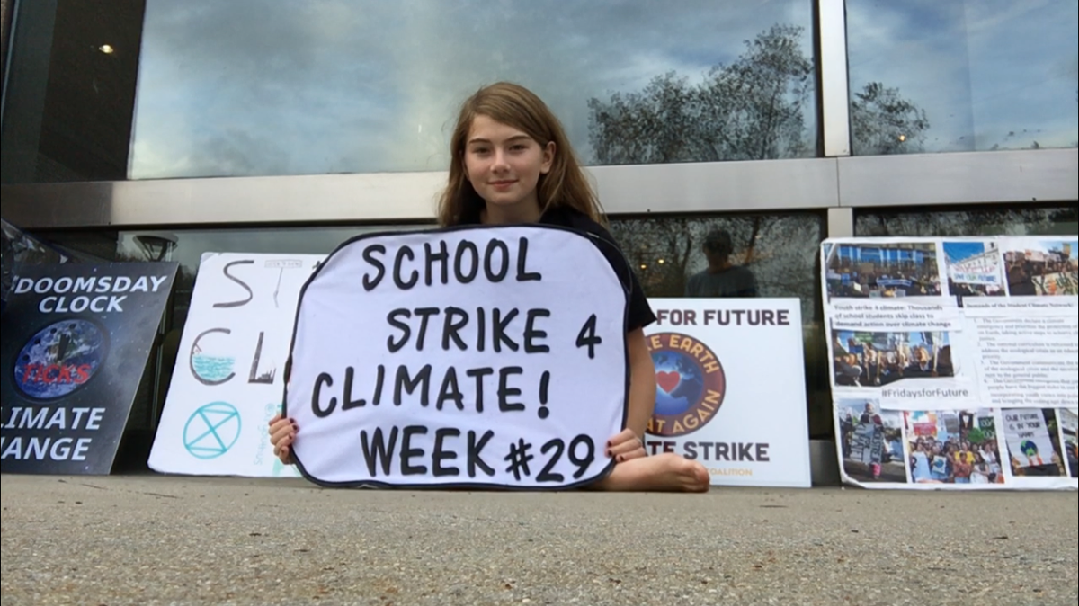 Myers Park High student Mary Ellis Stevens, 14, at one of her Friday “climate strikes” outside the Charlotte-Mecklenburg Government Center.