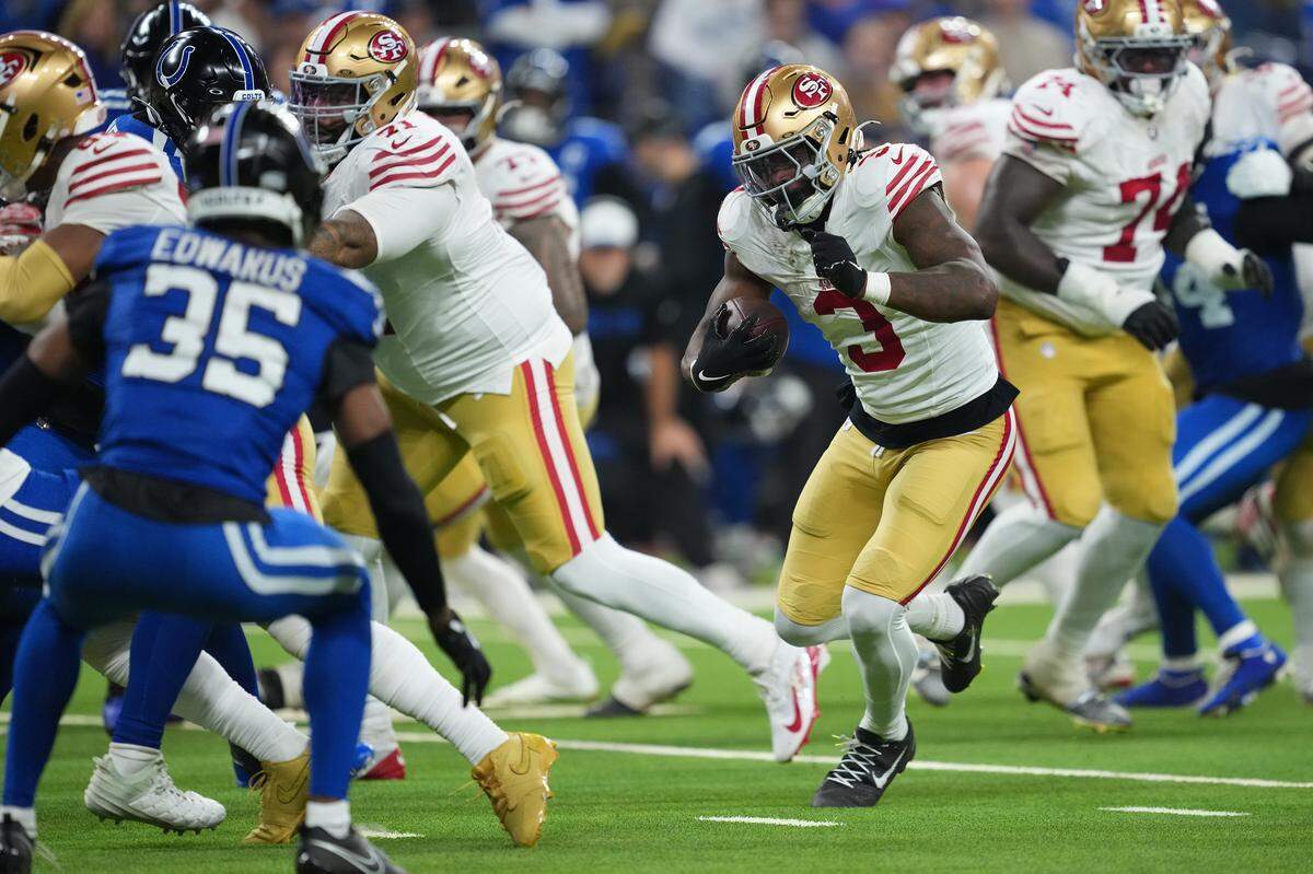 San Francisco 49ers running back Brian Robinson Jr. rushes for yards during the third quarter of the game against the Indianapolis Colts at Lucas Oil Stadium on Dec. 22, 2025 in Indianapolis, Indiana. (Photo by Dylan Buell/Getty Images)