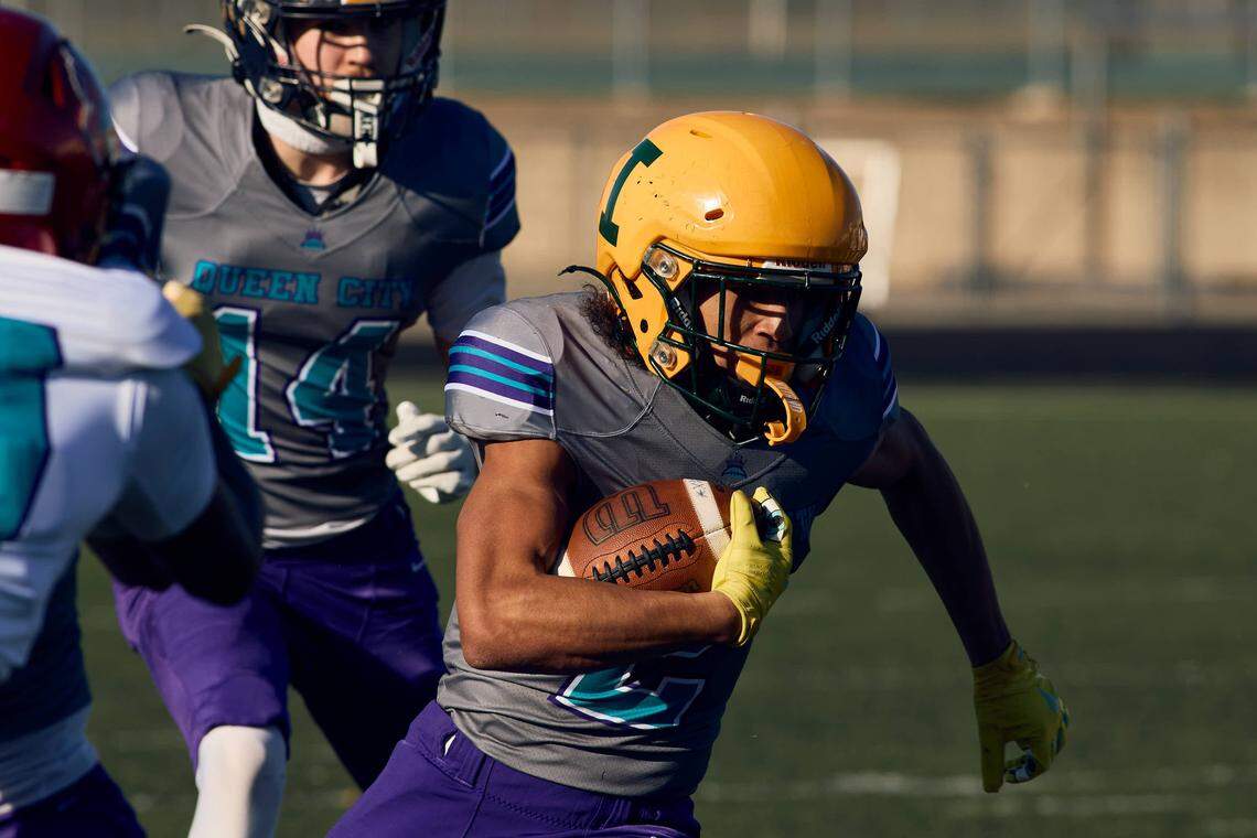 Independence RB Jayden Jones (2) carries the ball in the Queen City Senior Bowl hosted at Olympic High School.