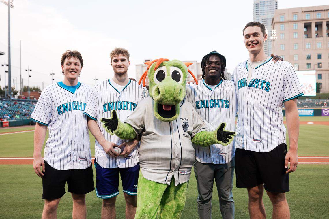 Charlotte Hornets rookies Kon Knueppel, Liam McNeeley, Sion James and Ryan Kalkbrenner pose at Truist Field before the Charlotte Knights hosted the Jacksonville Jumbo Shrimp on Friday night.