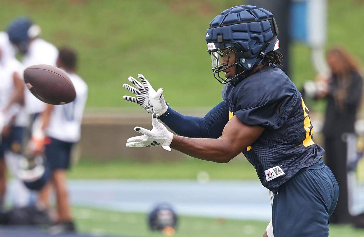 Johnson C. Smith University linebacker Quavaris Crouch reaches out to grab a pass during practice on Wednesday, August 6, 2025.