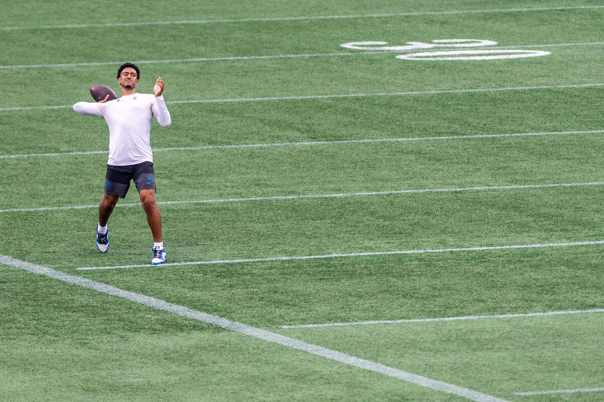 Carolina Panthers quarterback Bryce Young throws a football during the Carolina Panthers' fan fest open practice at the Bank of America Stadium in Charlotte, NC, Saturday August 2, 2025.
