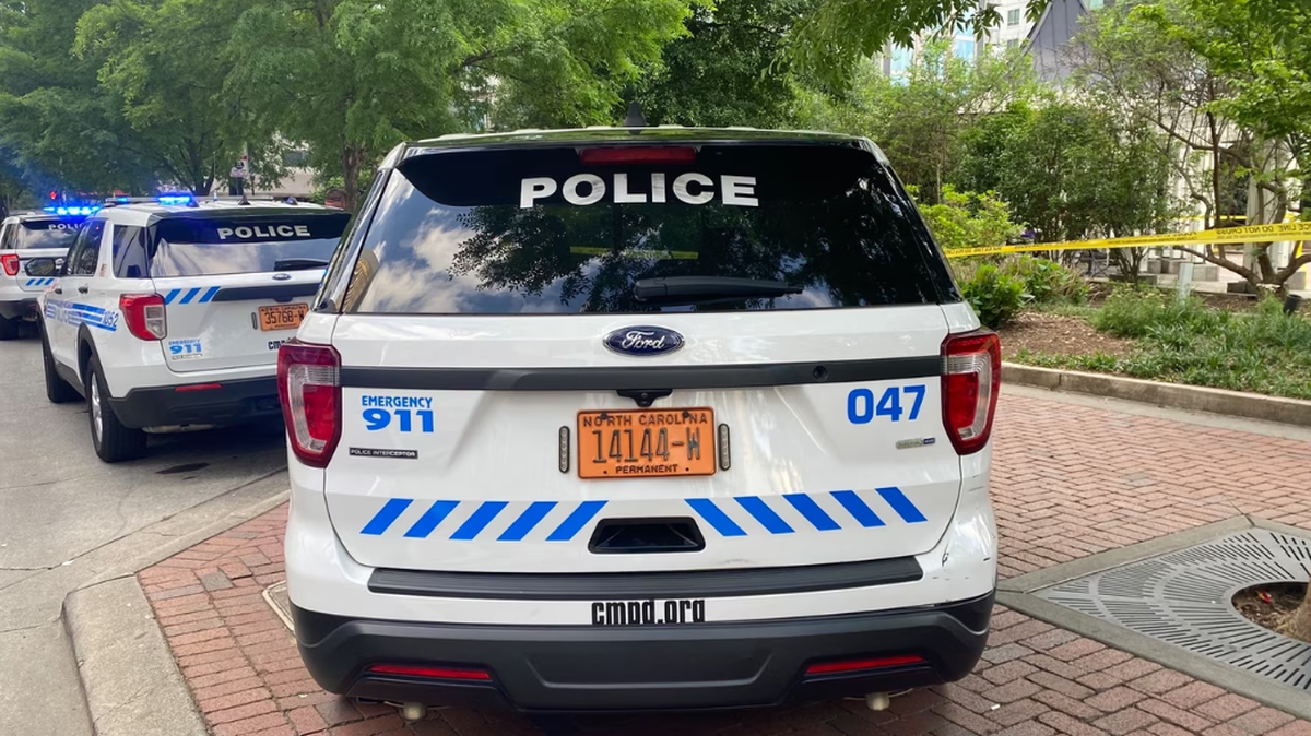 Charlotte-Mecklenburg Police respond to a double shooting Sunday afternoon at Romare Bearden Park. Police later identified a suspect in the case.