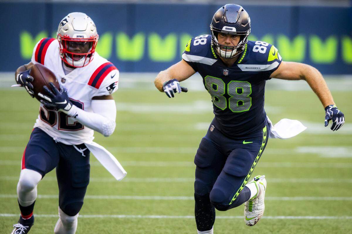 Seattle Seahawks tight end Greg Olsen had a ball bounce off his hands and directly to New England safety Devin McCourty Sunday, leading to a Patriots touchdown.