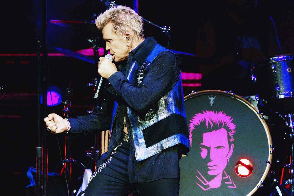 Billy Idol performs in concert at PNC Music Pavilion on Friday night.