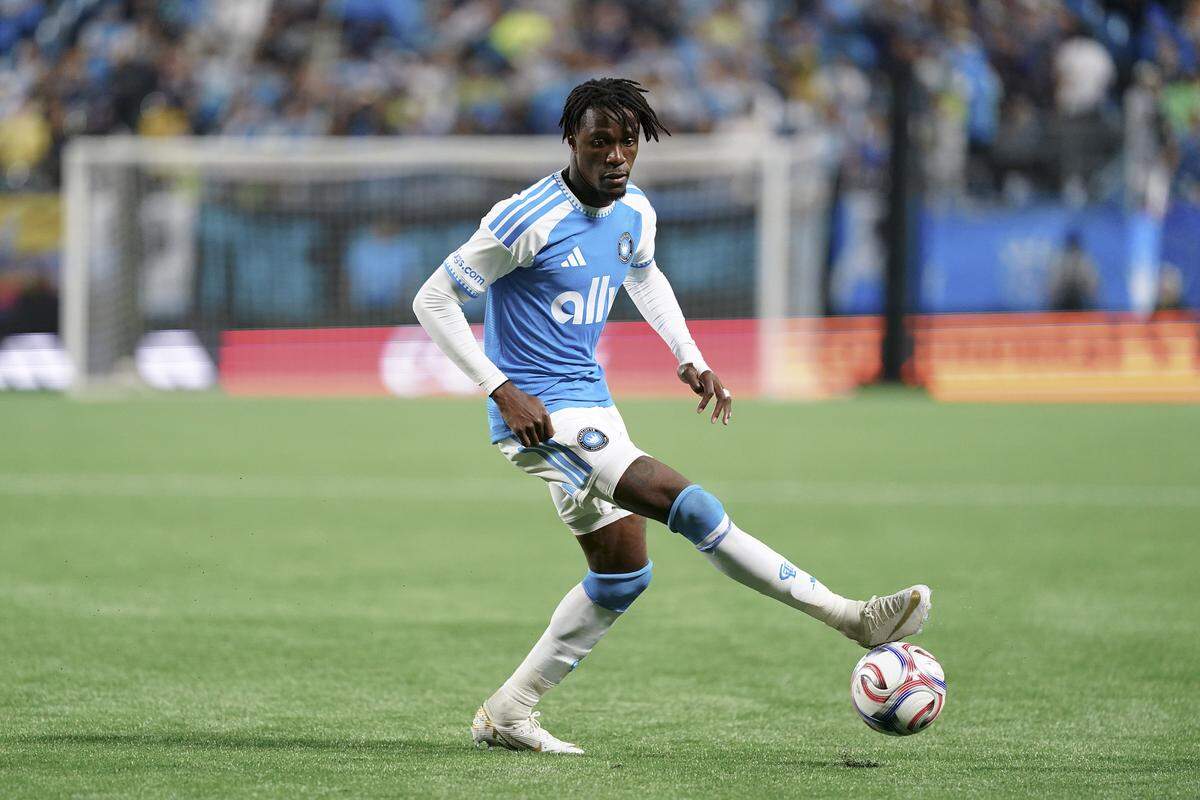 Wilfried Zaha of Charlotte FC dribbles the ball during a game against Inter Miami at Bank of America Stadium on March 14, 2026 in Charlotte, North Carolina. 