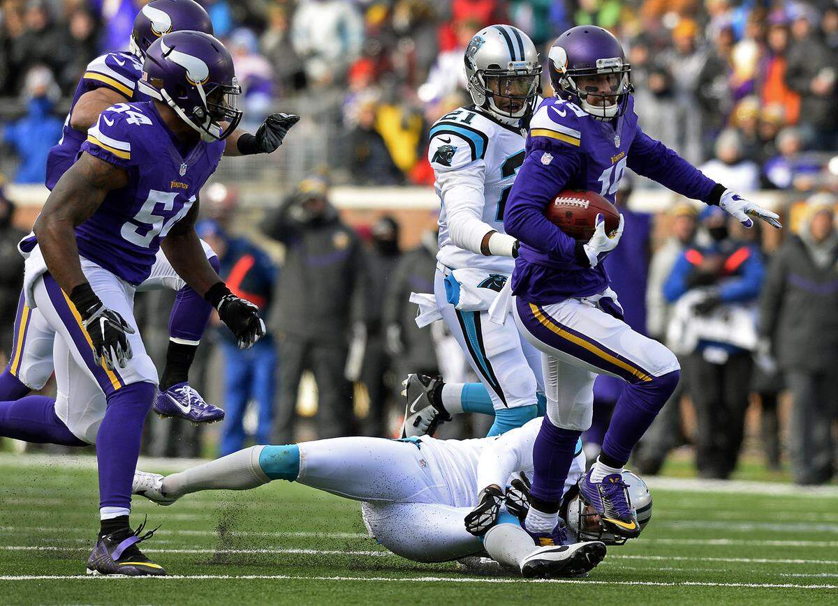 In 2014, Adam Thielen runs toward the end zone against the Carolina Panthers after blocking a punt. Thielen began his career with Minnesota, where he spent nine seasons and made the Pro Bowl twice as a wide receiver. Following two productive years with Carolina, the Panthers traded him back to Minnesota Wednesday.