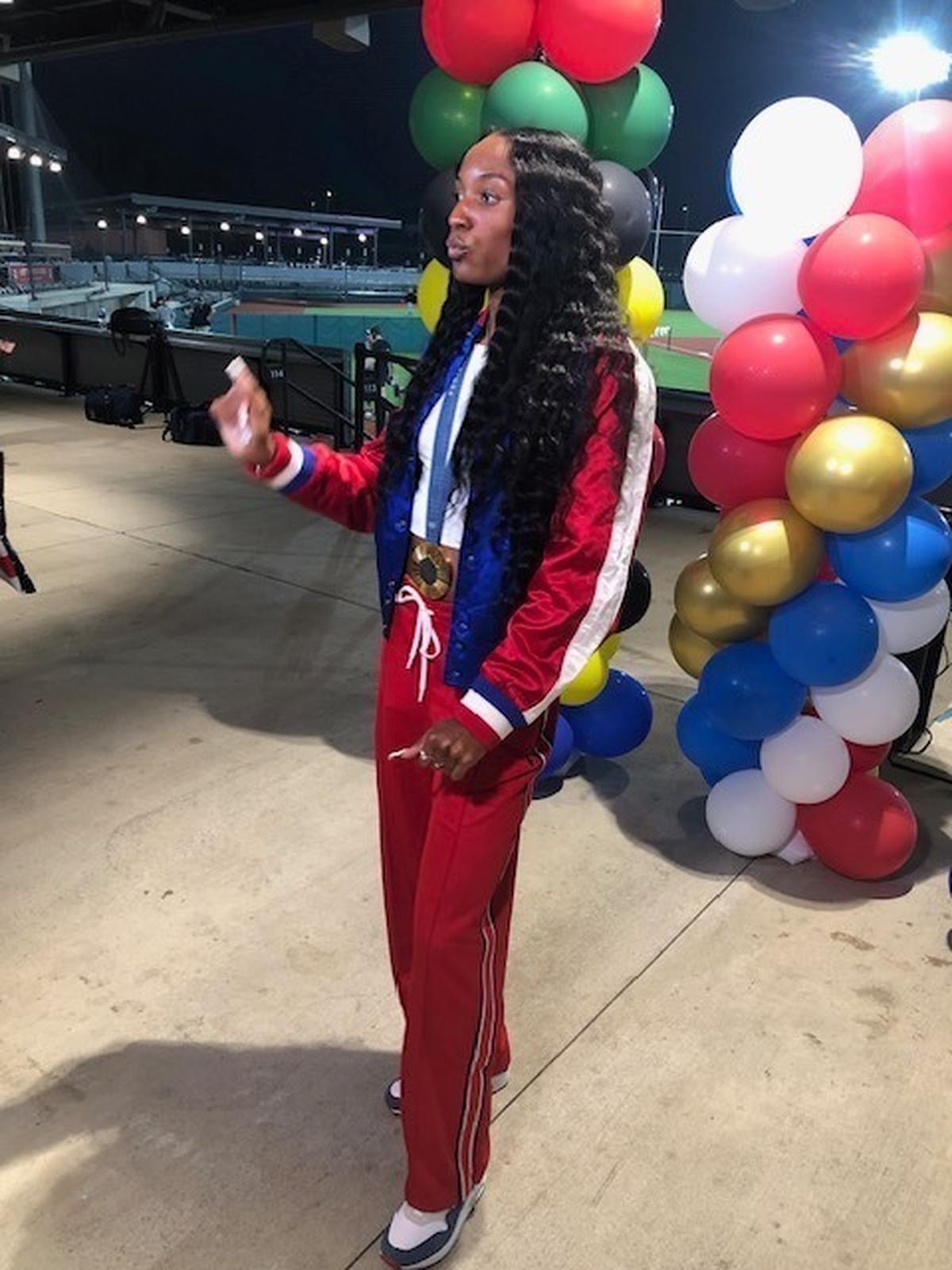 Olympic gold medalist Kaylyn Brown speaks to reporters in Gastonia Wednesday.