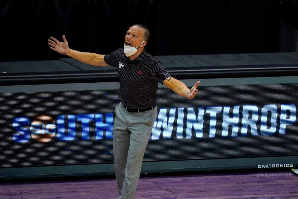 Winthrop head coach Pat Kelsey questions a call as his team played against Villanova in the second half of a first round game in the NCAA men’s college basketball tournament at Farmers Coliseum in Indianapolis, Friday, March 19, 2021. (AP Photo/Michael Conroy)