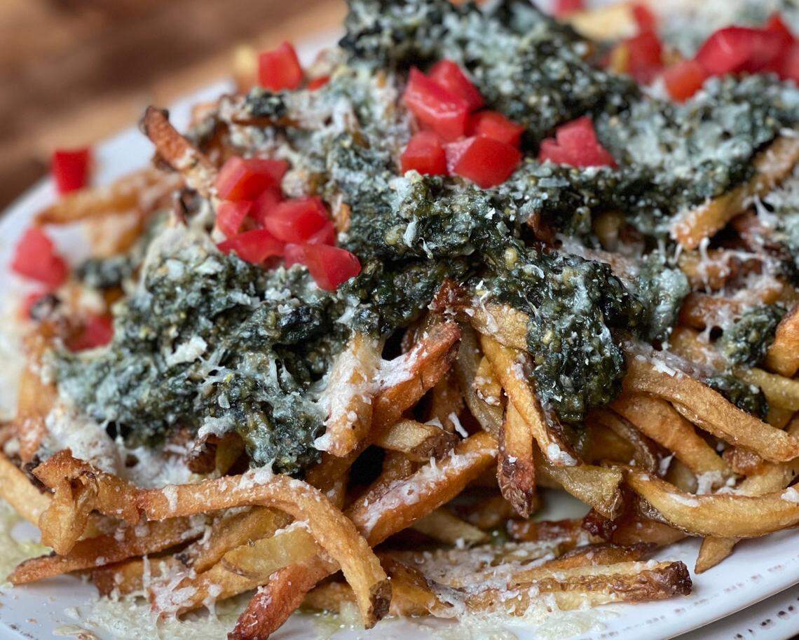 Crepe Cellar’s Pesto Brie Fries: Hand-cut French fries are fried twice for extra crispiness and come topped with a traditional pine nut basil pesto, brie and tomatoes.