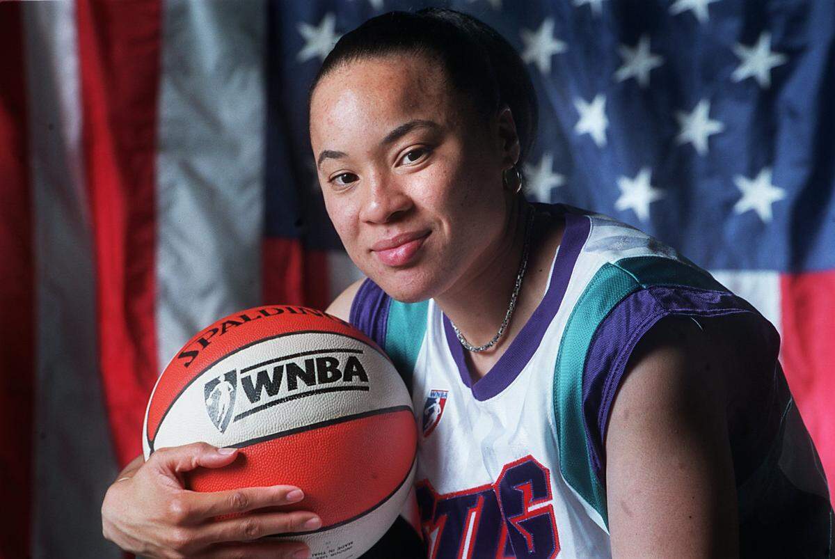 On May 25, 2000, Charlotte Sting point guard Dawn Staley posed for The Charlotte Observer prior to playing for the United States in the Summer Olympics, held that year in Australia.