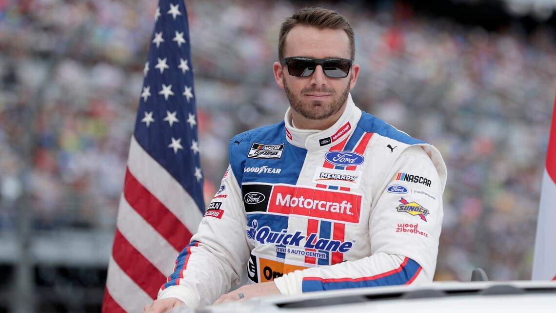 Matt DiBenedetto takes a parade lap in front of fans before the NASCAR Daytona 500 auto race at Daytona International Speedway, Sunday, Feb. 16, 2020, in Daytona Beach, Fla. (AP Photo/John Raoux)