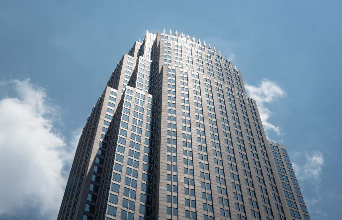 Bank of America has about 213,000 employees, including 19,000 in the Charlotte area. Shown, the bank’s corporate center in uptown Charlotte. The bank is giving its employees more shares of company stock when those shares recently hit an all-time high.