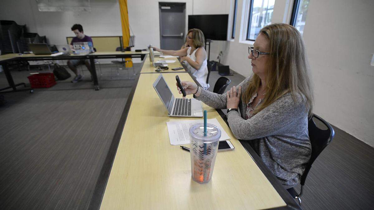 Phone bank volunteer Charlotte Dudley completes a campaign call while at the Gameplan Phone Bank sponsored by NC Sen. Jeff Jackson at Advent Coworking on Thursday, May 24, 2018.