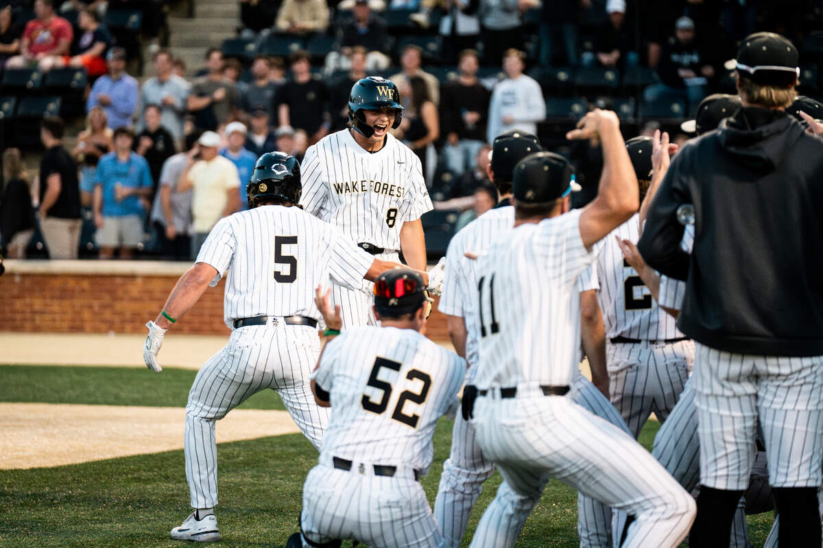 Nick Kurtz, top, celebrates with his record-breaking Wake Forest team, which is taking on Alabama in a Super Regional series starting at noon Saturday, June 10, 2023.