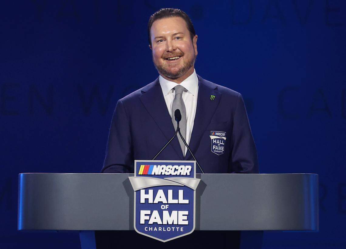 Former NASCAR driver Kurt Busch smiles as he recalls his career during his NASCAR Hall of Fame Induction speech at the Charlotte Convention Center in Charlotte, NC on Friday, January 23, 2026. 