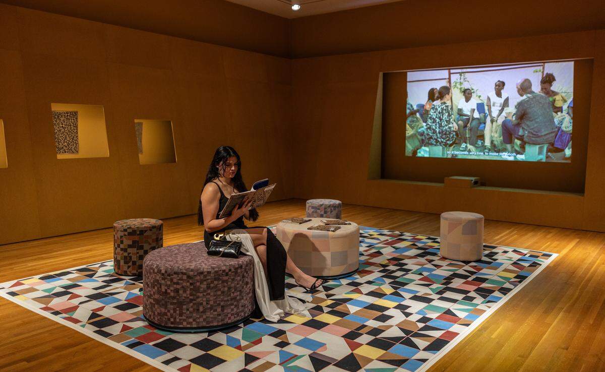 People look a the "Designing Dynamism: Kuba Textiles from the DR Congo, The Wesley Mancini Collection," at the Mint Museum Randolph in Charlotte, N.C., on Thursday, February 19, 2026.