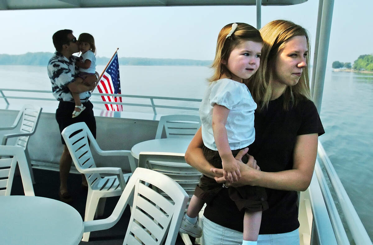 Families enjoy a story time cruise on Lake Norman aboard the Lady of the Lake yacht in 2006.