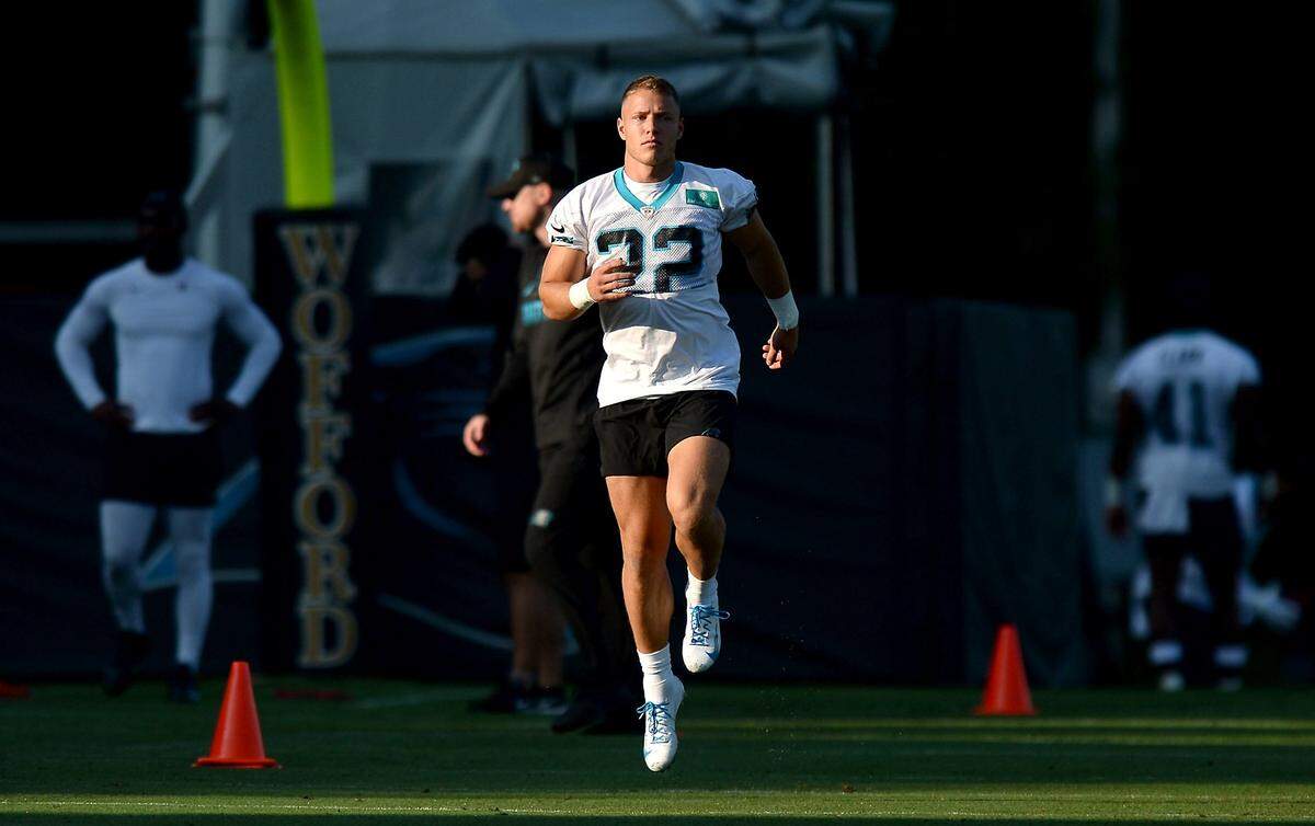 After 308 days of not playing in a real NFL game, Carolina Panthers running back Christian McCaffrey takes the field against the New York Jets on Sunday.