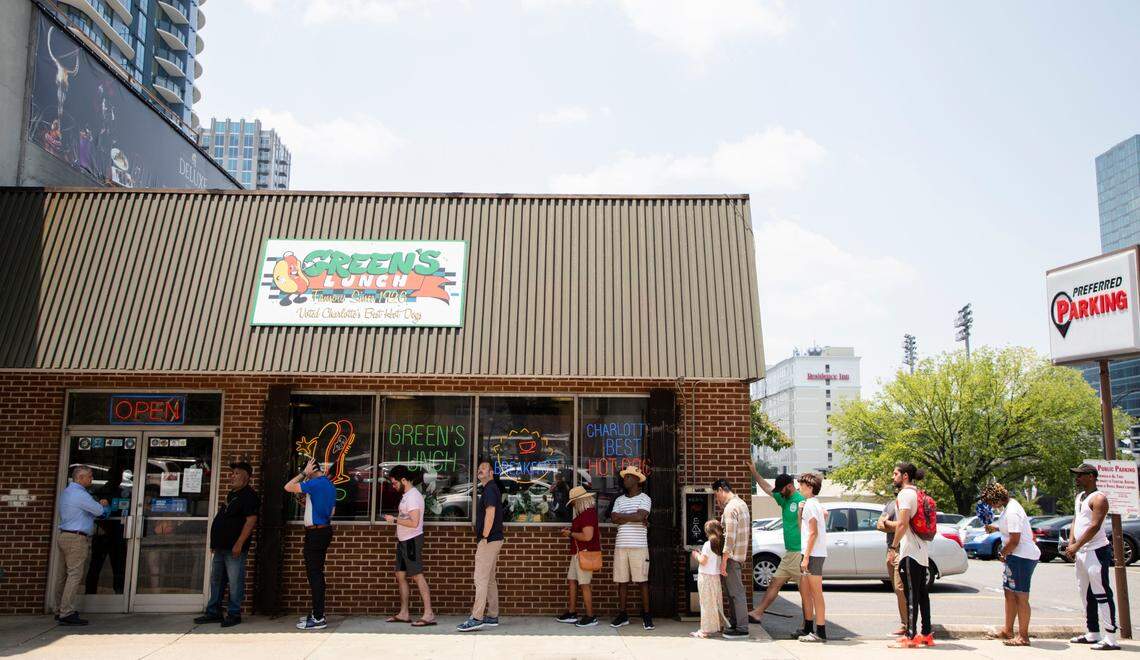 Patrons of Green’s Lunch wait in line on Wednesday, the last day of operation after 97 years.