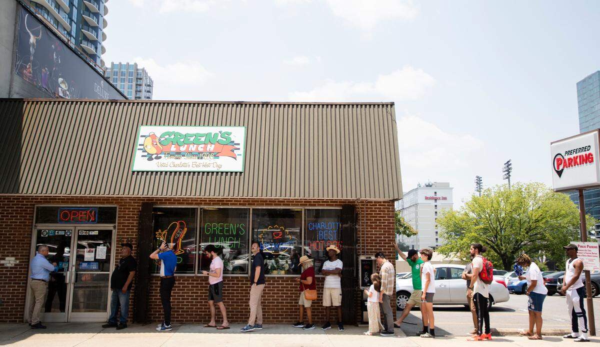 Patrons of Green’s Lunch wait in line on Wednesday, the last day of operation after 97 years.