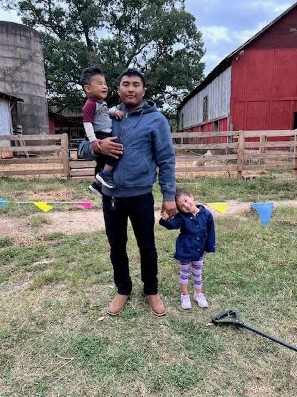 Miguel Angel Garcia Martinez, arrested Sunday, Nov. 16, 2025 in Charlotte by the U.S. Border Patrol, is shown here with his two children.