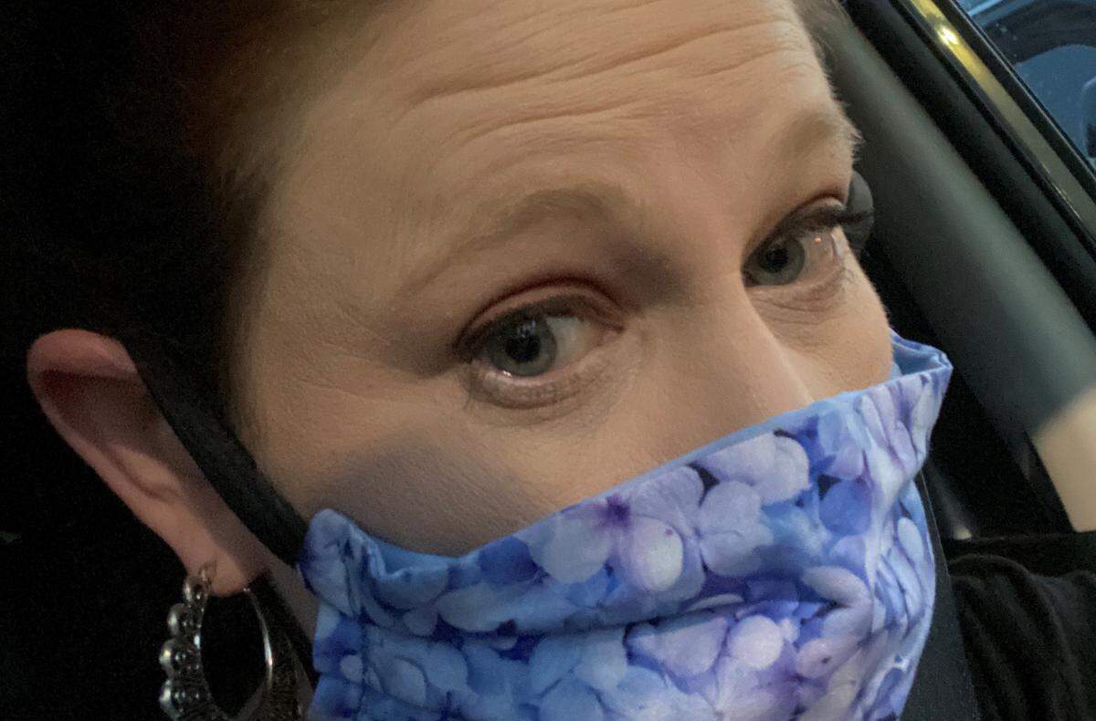 Ashley Vargas received her purple hydrangea mask from her mother in Georgia, who’s very high-risk and has not been able to leave home. She says her mom has been using her time to make masks for friends and family who are essential workers.