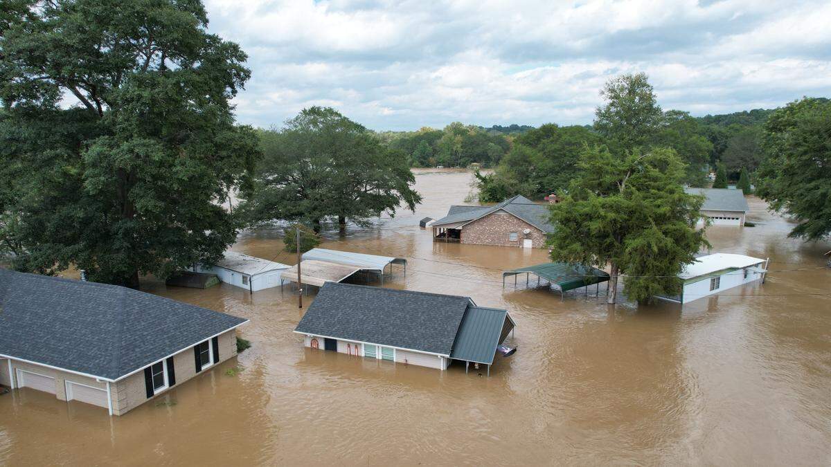 A drone photograph taken on Sept. 28, 2024, shows homes below Mountain Island Lake submerged in flood water from the Catawba River.