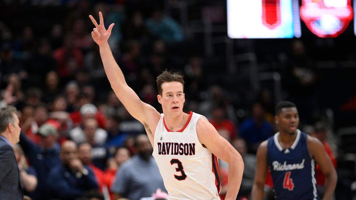 Davidson forward Sam Mennenga gestures after he made a three-point basket the Atlantic 10 conference tournament final Sunday. Davidson lost that A-10 final, 64-62 to Richmond, but made the NCAA tournament anyway.